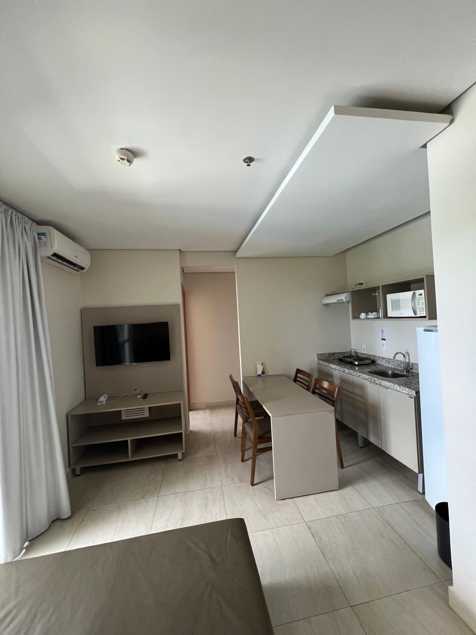 Sala integrada à cozinha